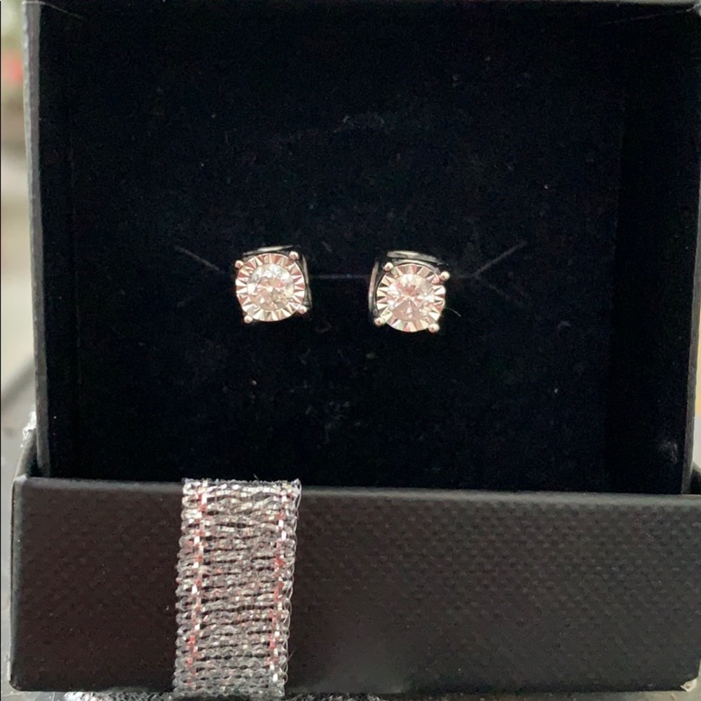 3/4 brand new diamond earring from Macy’s.